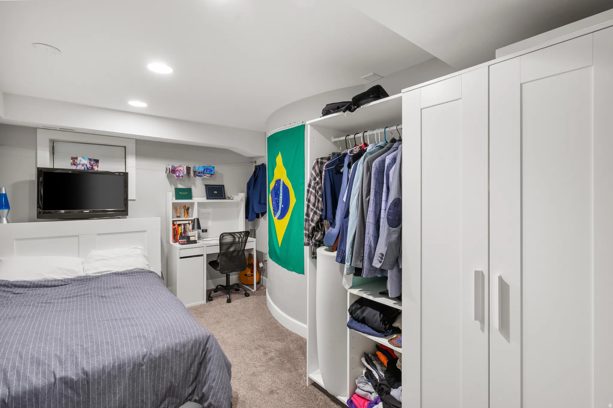 Integrated custom cabinetry and open shelving storage system