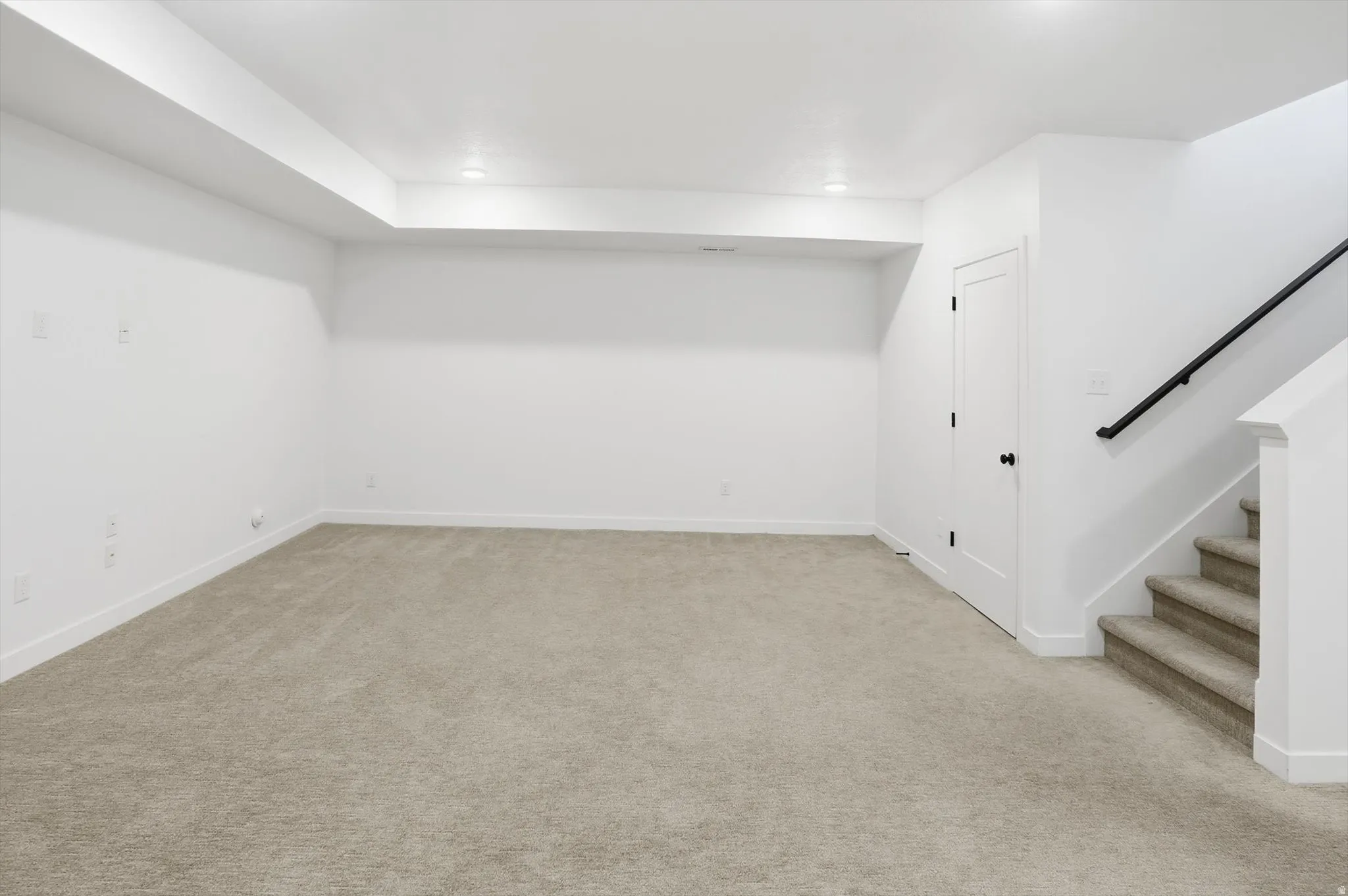The builder-finished basement expands the home's versatility with 9-foot ceilings, two additional bedrooms, and two open flex spaces that can be used as a secondary living room, media area, private office, fitness space, hobby room, guest area, or potenti