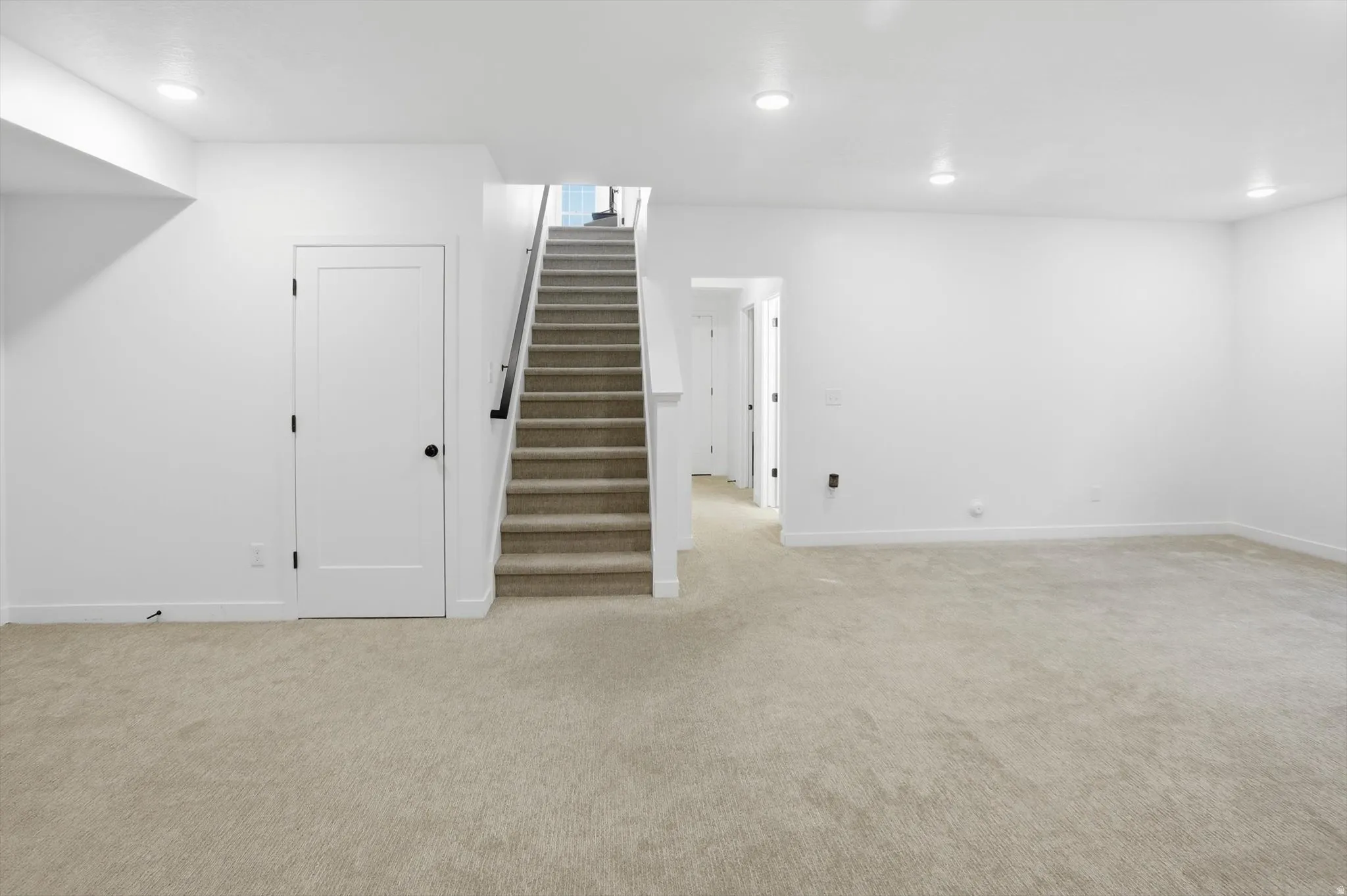 9ft ceiling builder finished basement with 2 flex spaces for a media room, office, gym, playroom, hobby area, guest retreat, or 5th bedroom depending on municipality rules.