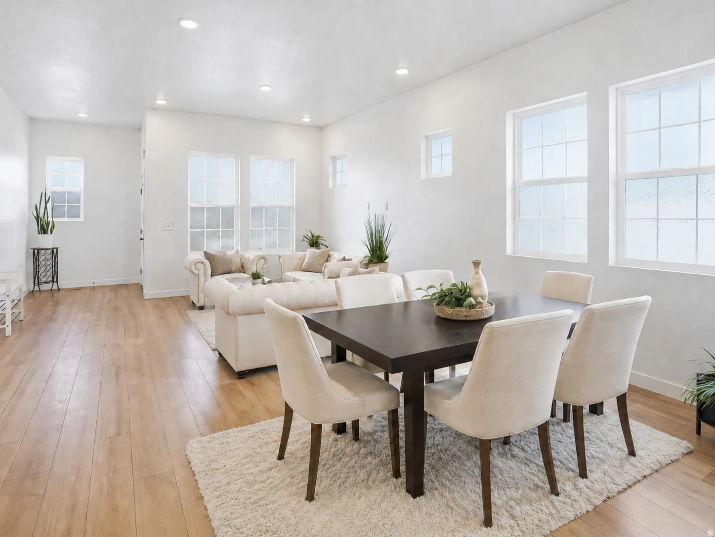 Open-concept living space professionally designed featuring with 10ft ceilings, quartz counter tops throughout, and lots of windows for so much natural light! Sink-free island