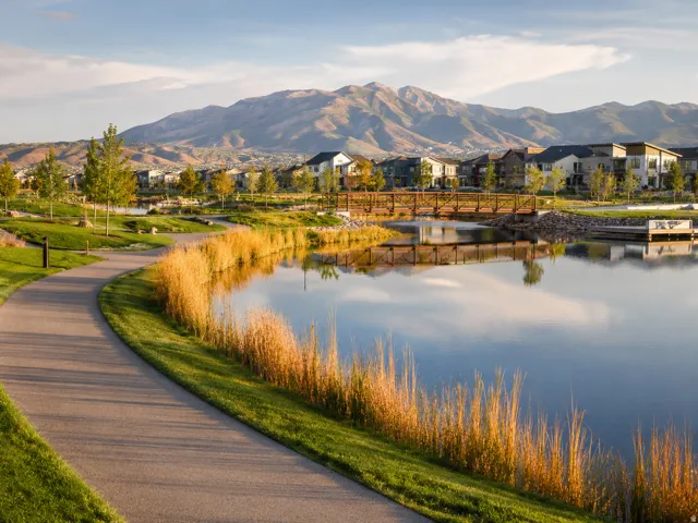 Daybreak is designed for outdoor living, with trails, parks, lakes, pools, playgrounds, sports courts, and open spaces woven throughout the community, making recreation feel like part of everyday life.