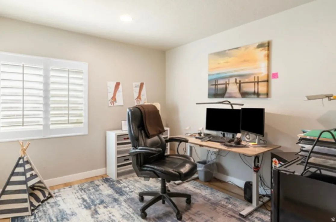 Light-toned walls with recessed ceiling lighting