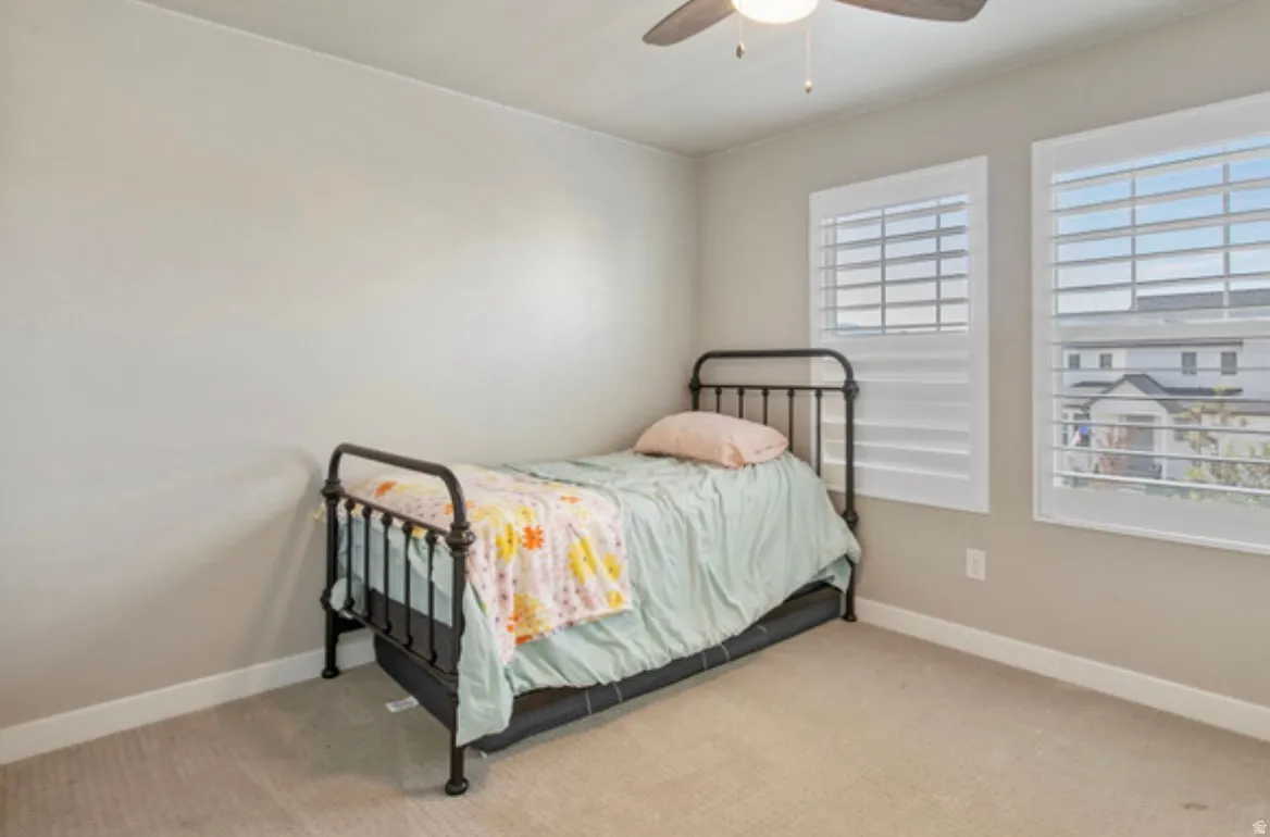 Neutral tone walls complemented by light-colored carpet flooring