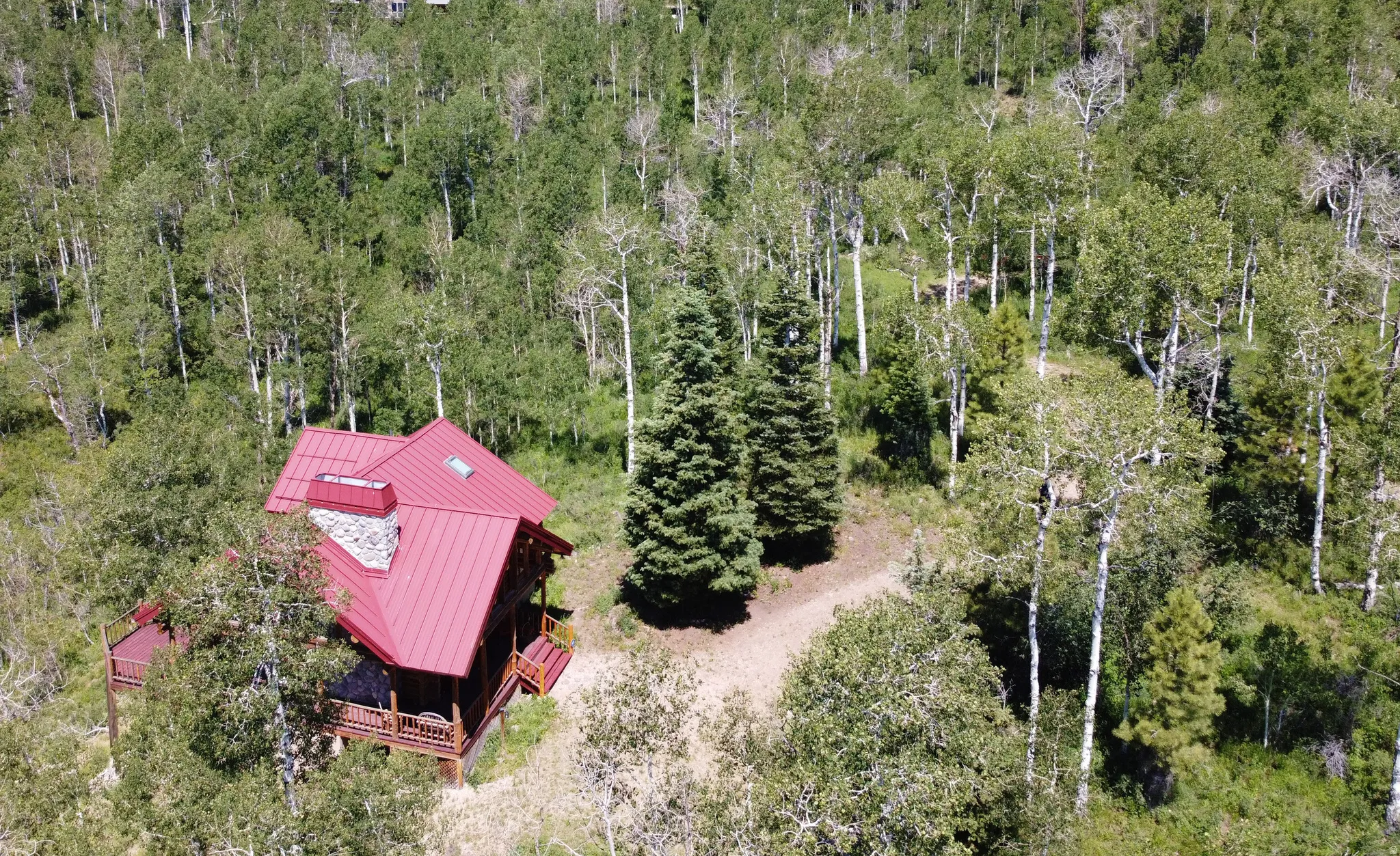 Aerial view front and south side of cabin