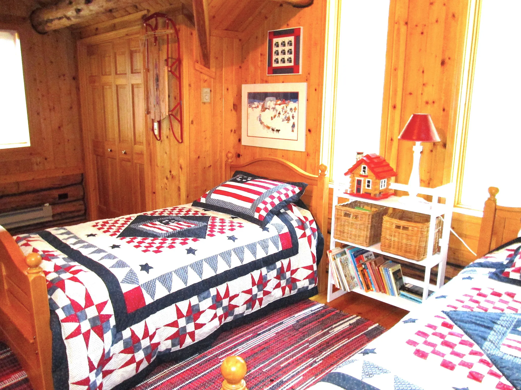 Loft bedroom with large closet and baseboard heating. The twin beds convert to bunk beds.