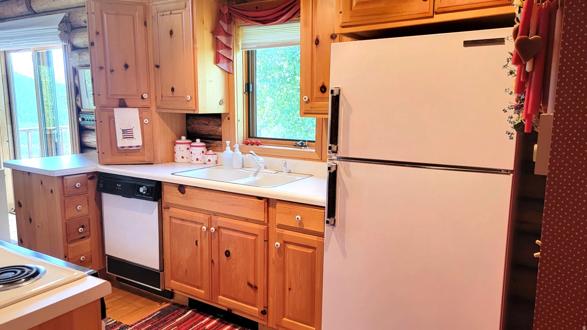 Kitchen view 6: West wall of the kitchen with beautiful casement window  and great views!
