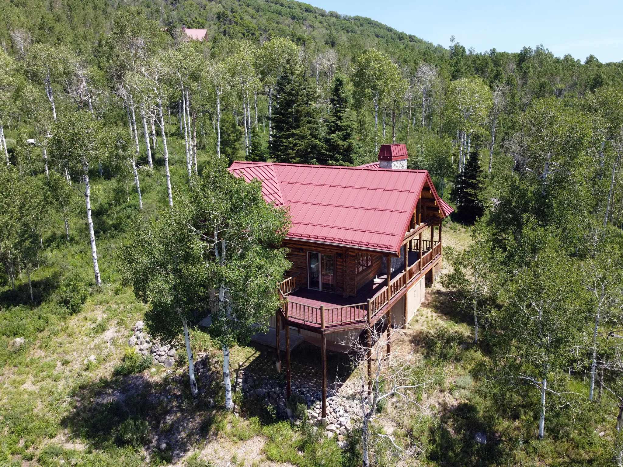 Aerial view west and south side of cabin.