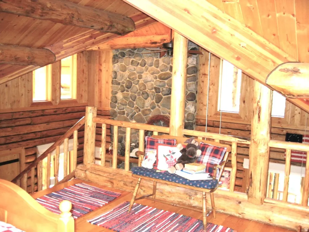 Loft overlook to the main floor. Clerestory windows add views and sunlight on both levels.