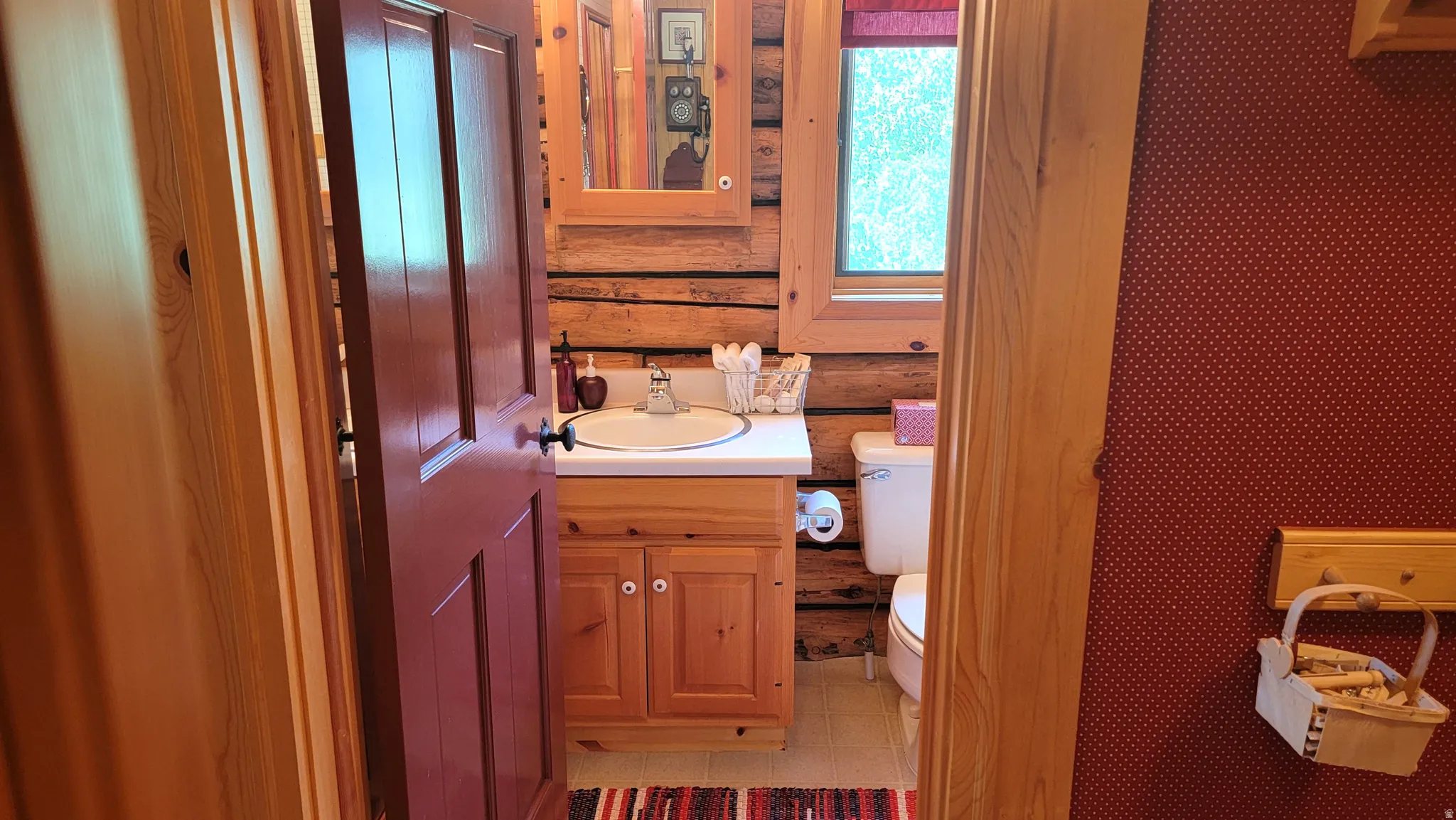 View to the main floor bath from the laundry room.