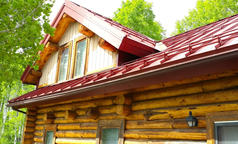 The cabin has a newer red heavy duty standing steel roof, with and heavily engineered snow guards for safety, to keep snow from sliding off the roof.