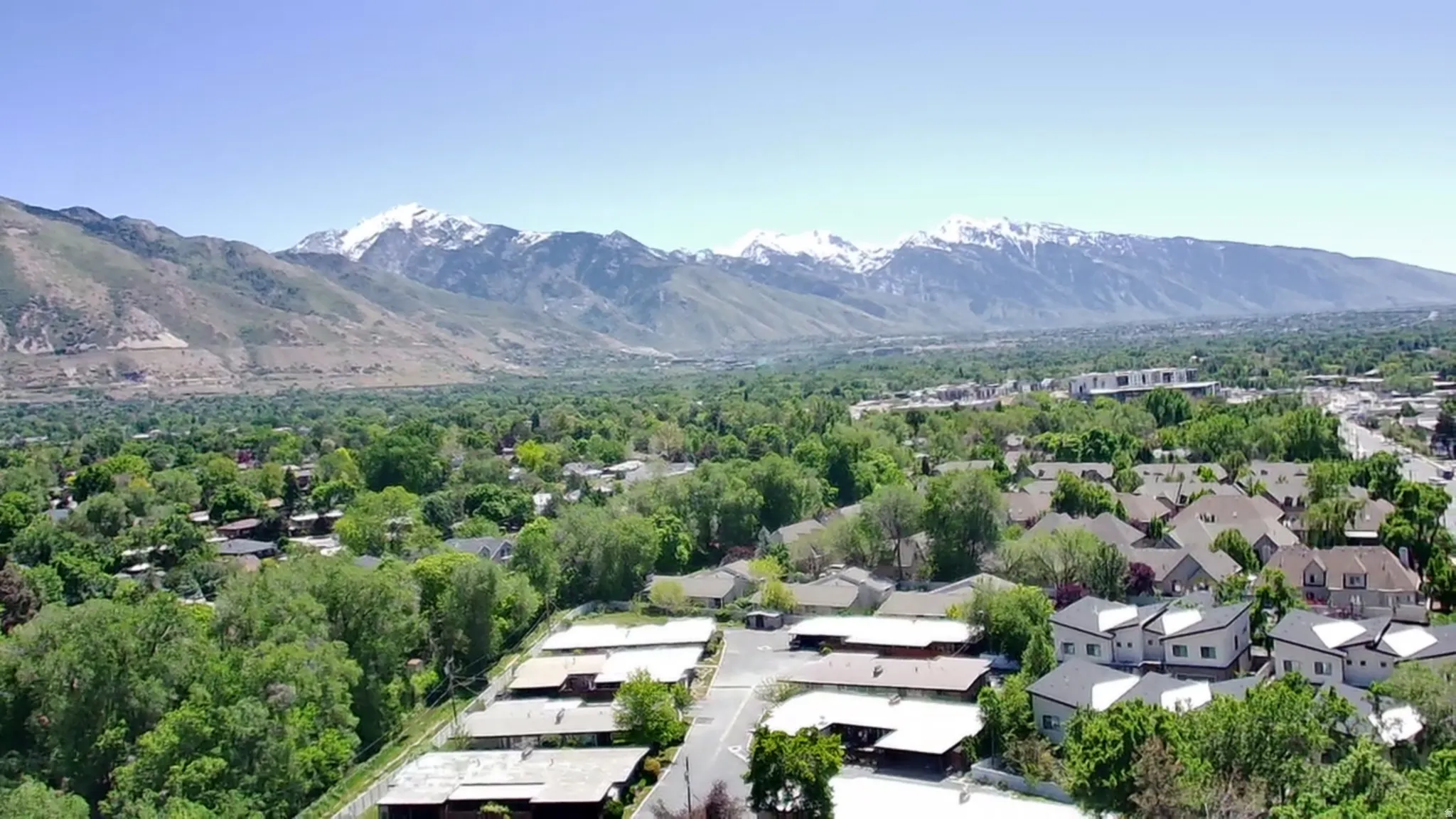 Aerial perspective showcasing a residential area with varied housing styles