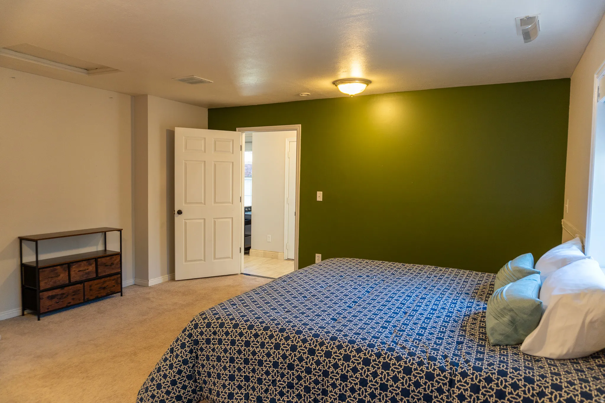 Neutral tone walls complemented by an accent wall