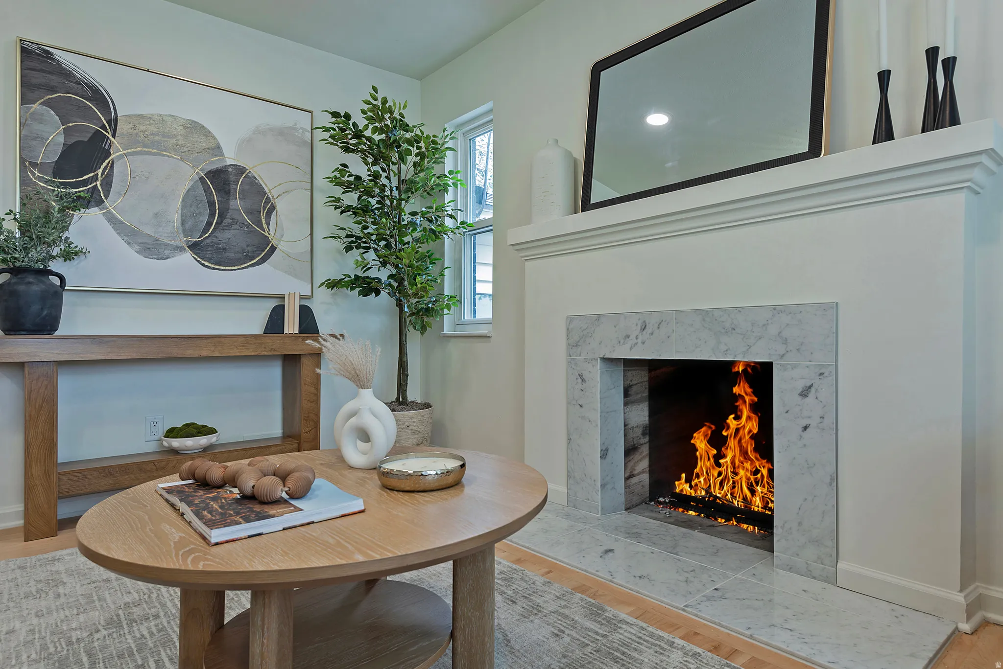 Fireplace featuring a stone surround and hearth