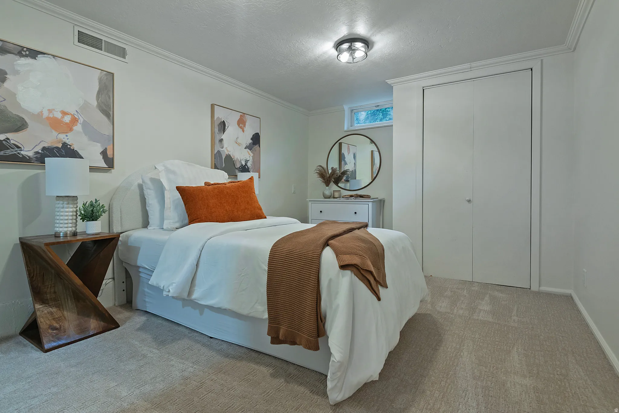 Plush carpet flooring complements crisp white walls