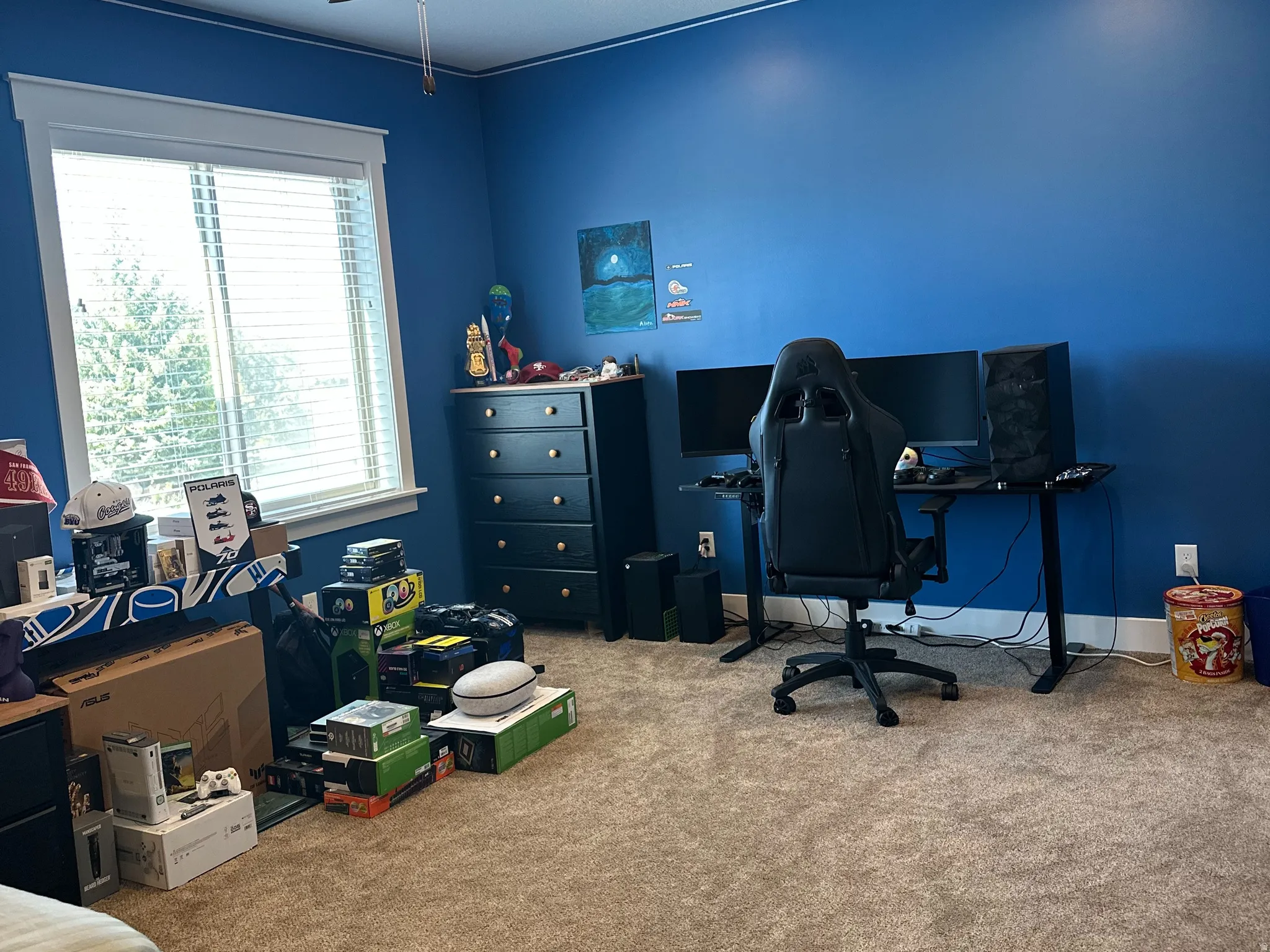 Spacious room featuring plush carpeting, a ceiling fan with integrated lighting, and recessed overhead lighting