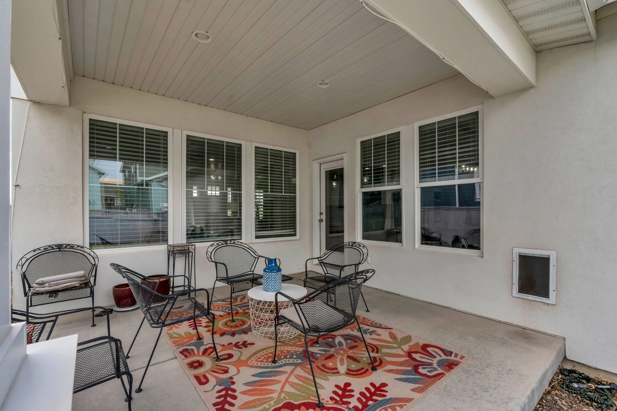Extend your living space outdoors with this inviting covered patio, perfectly positioned just off the kitchen, dining area, and great room. Whether you're hosting friends, enjoying family dinners, or simply relaxing with your morning coffee, this seamless