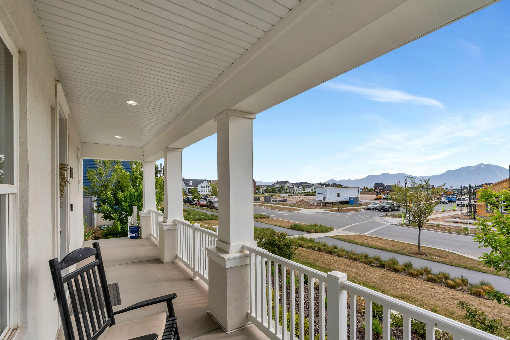 Expansive covered front porch offers beautiful views.