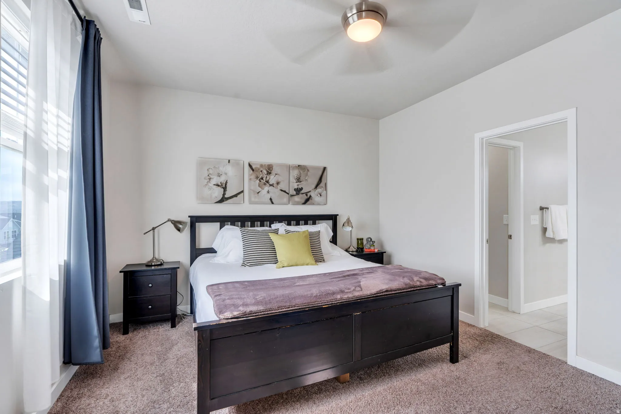 Primary bedroom has beautiful views of the Wasatch mountains