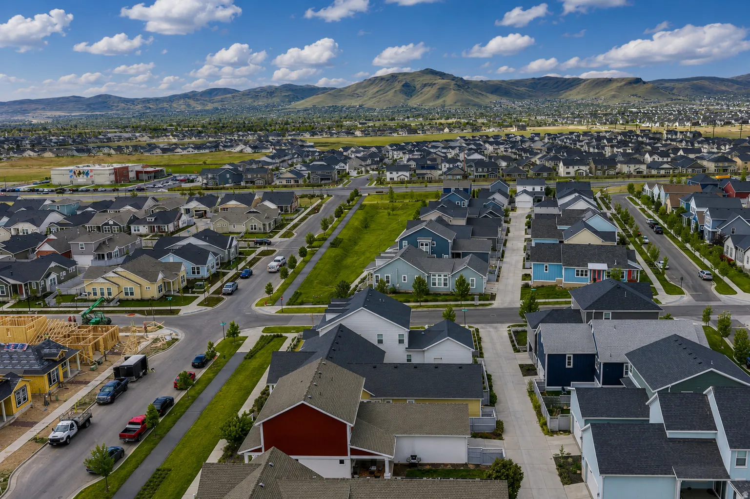 Expansive residential development featuring a variety of single-family homes with diverse exterior finishes