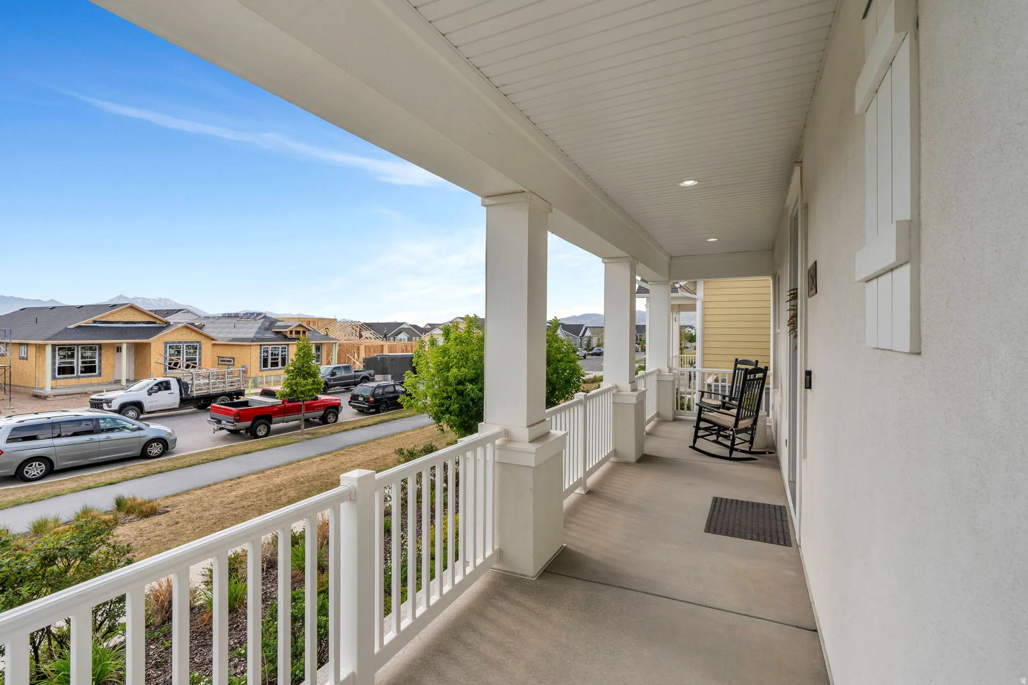 Covered porch offers beautiful mountain views and shady evenings.