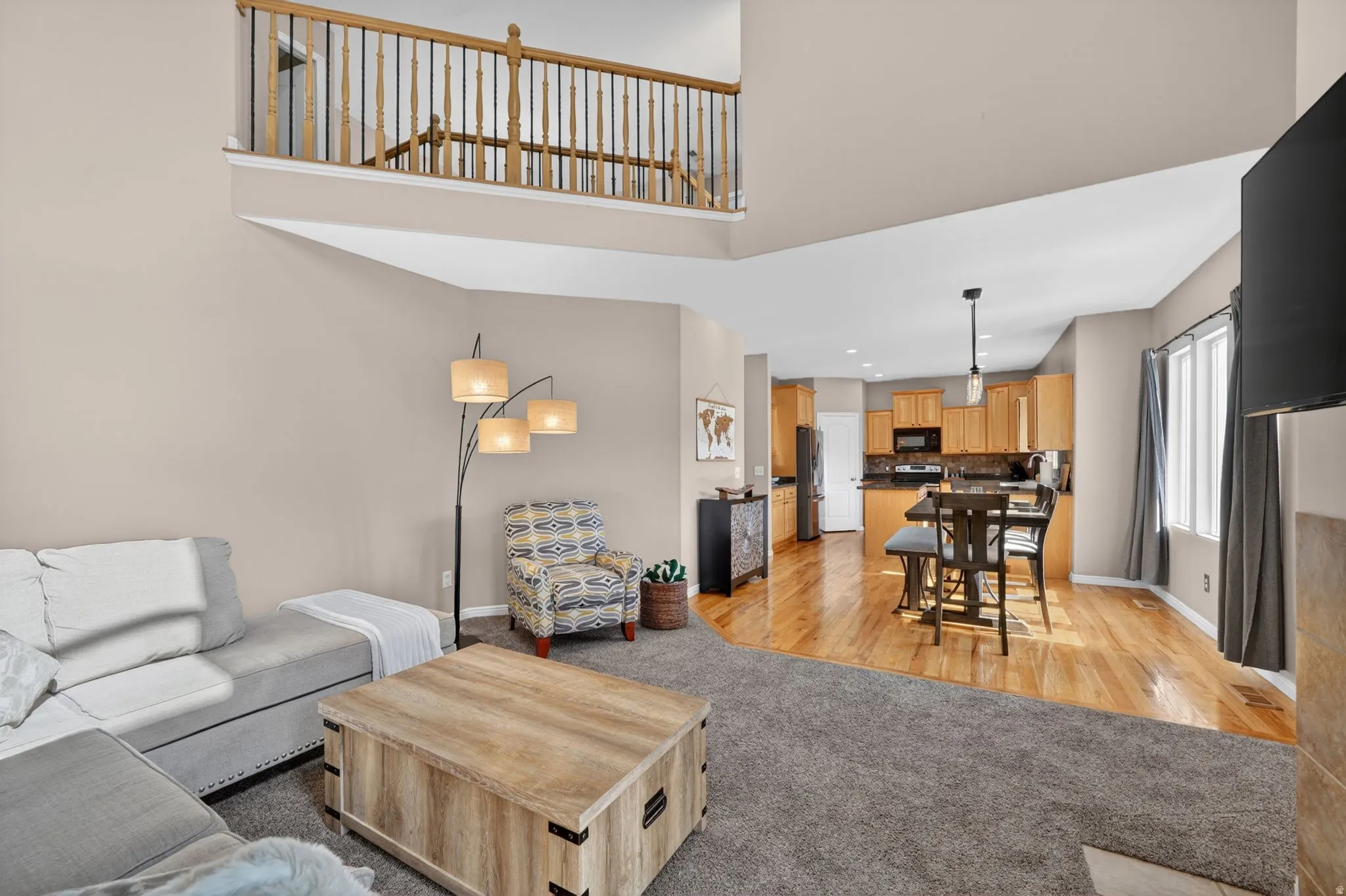 Two-story living area with an open-concept layout