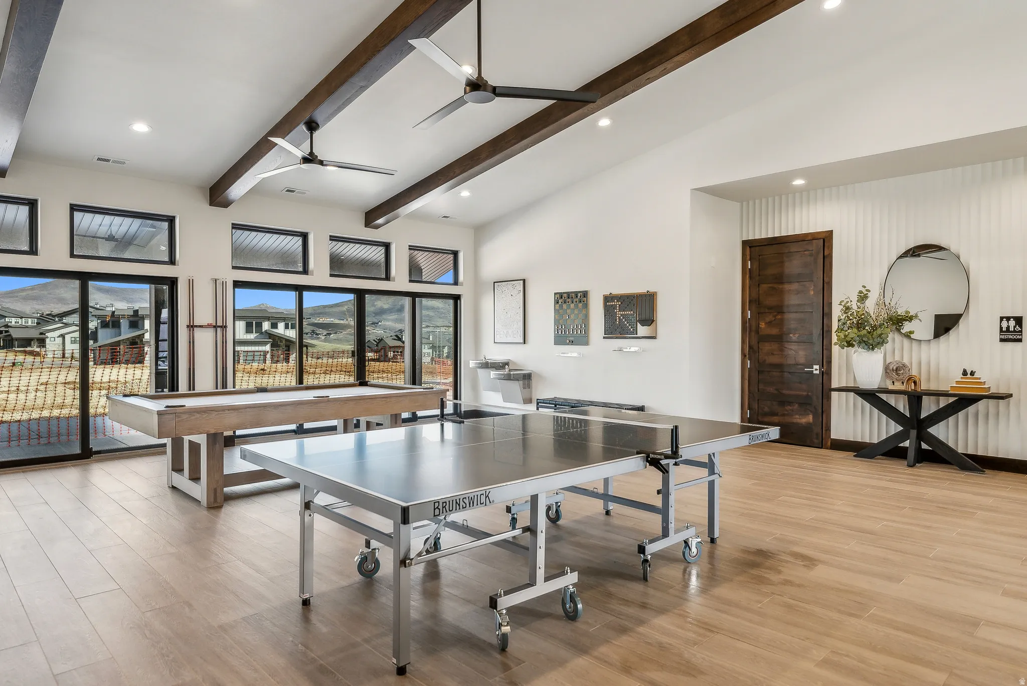 Spacious interior with vaulted ceilings and exposed wood beams