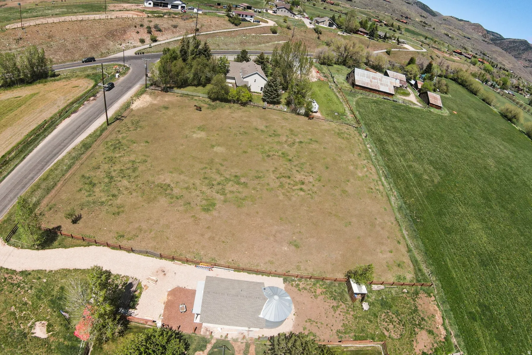 Expansive land parcel with surrounding agricultural fields