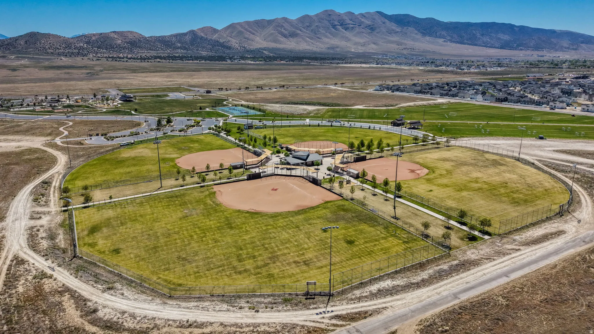 Aerial perspective showcasing a multi-field sports complex