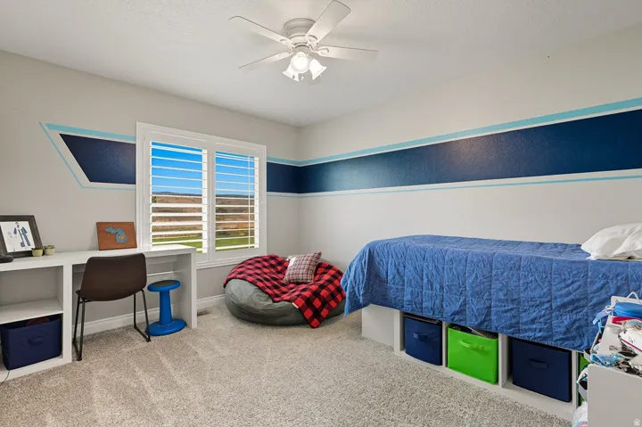 Bedroom featuring a window with mountain view