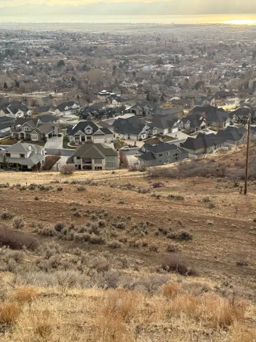 Hillside residential development with varying architectural styles