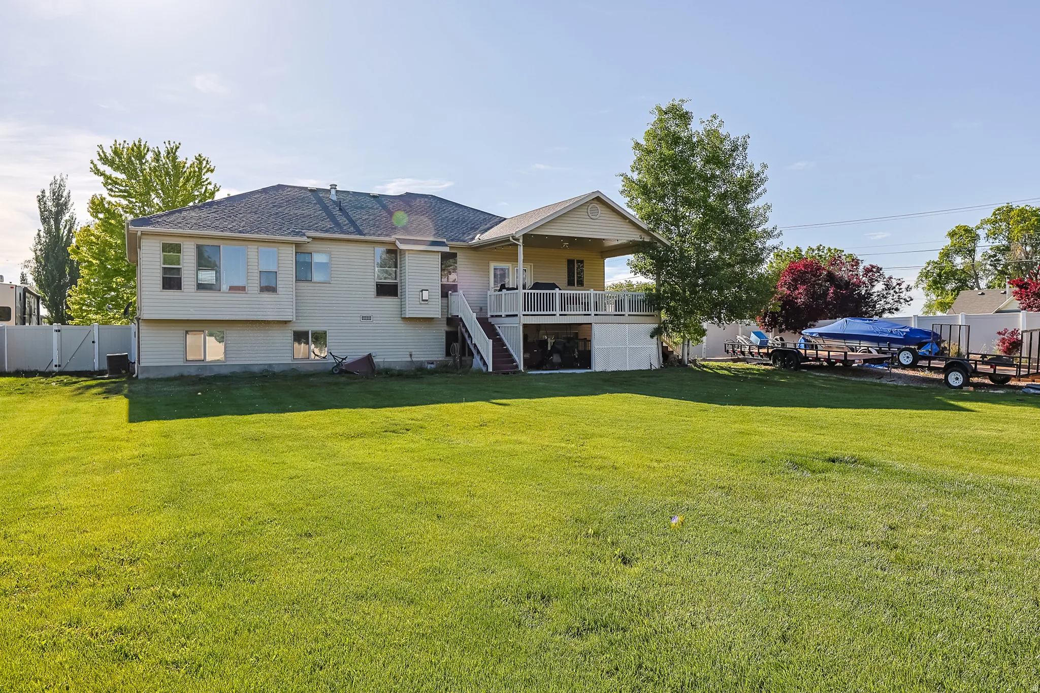 Expansive green lawn providing ample outdoor space