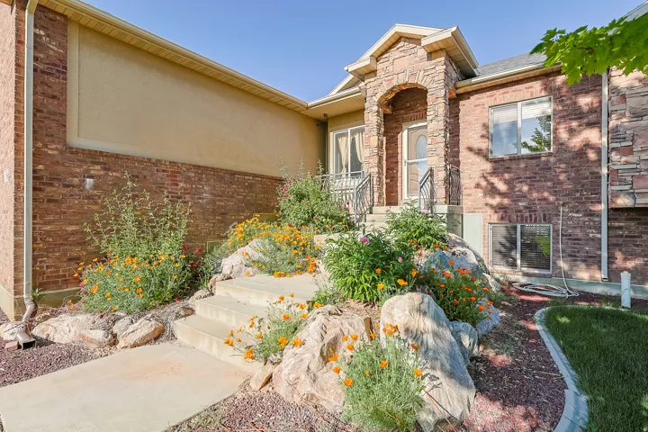 Brick and stucco exterior with stone accents