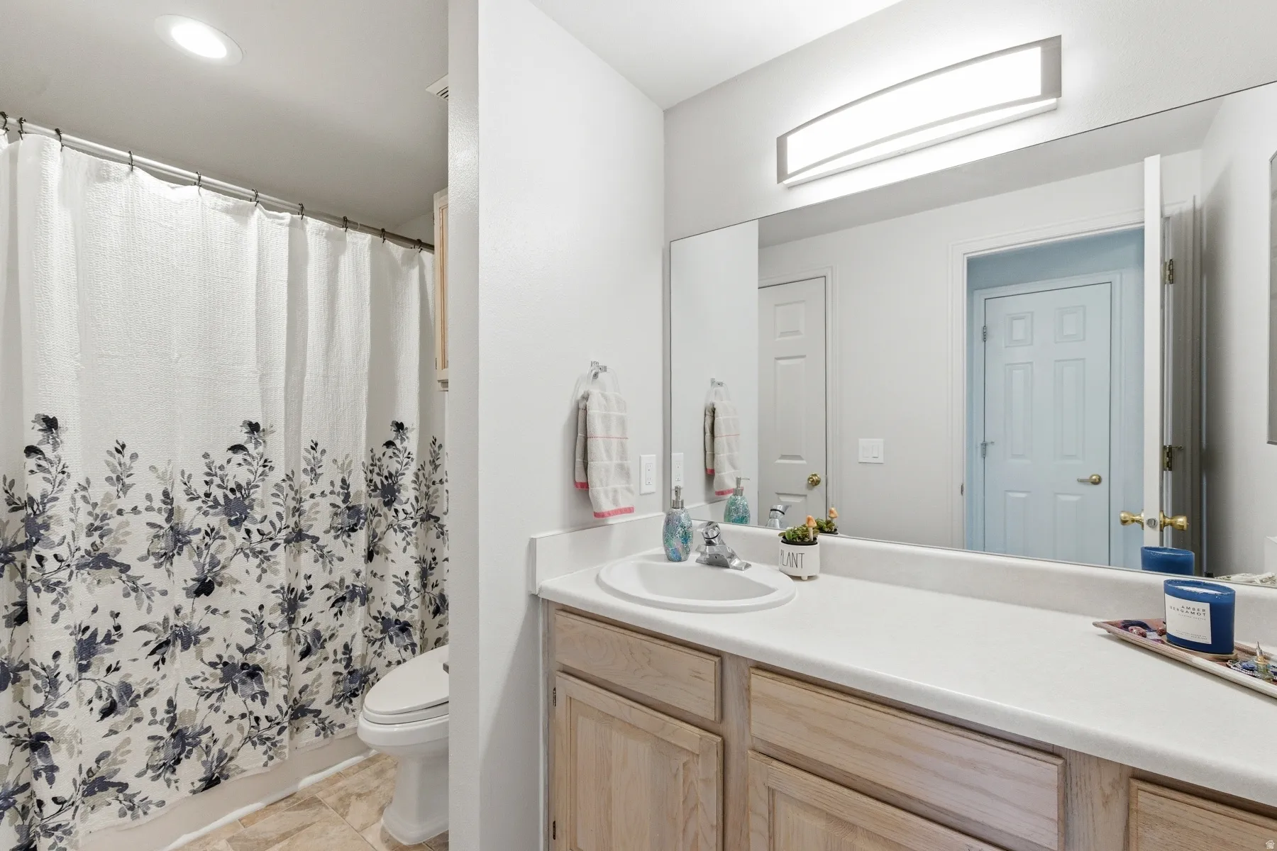 Full-width vanity mirror and light fixture