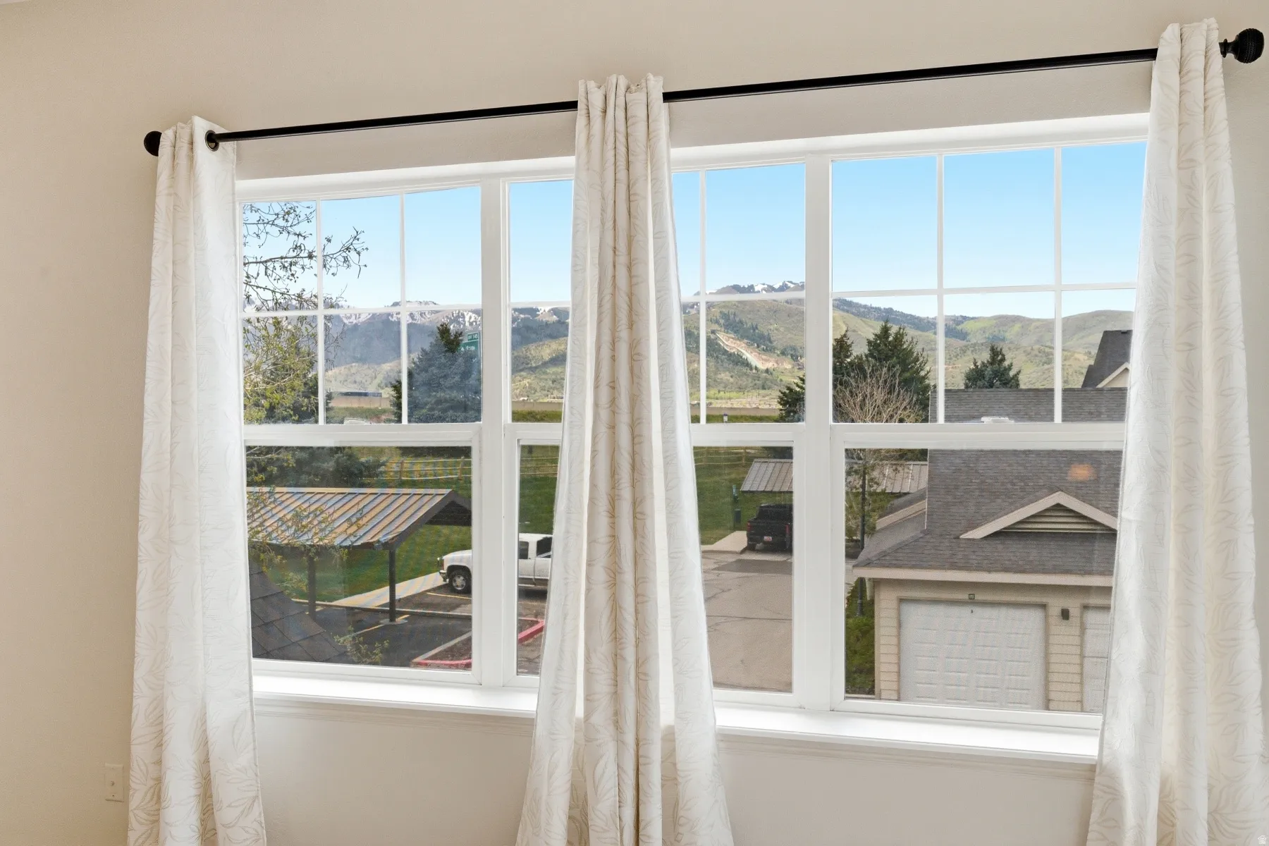 Expansive window with mountain scenery