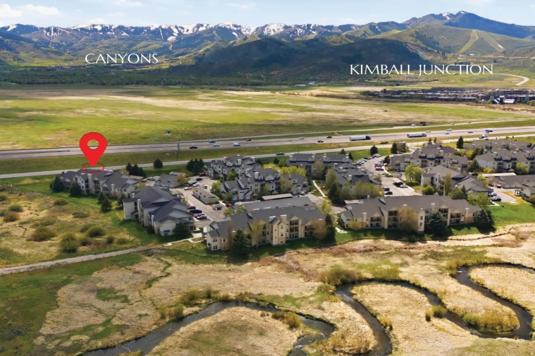 Aerial perspective featuring a residential complex with multiple buildings