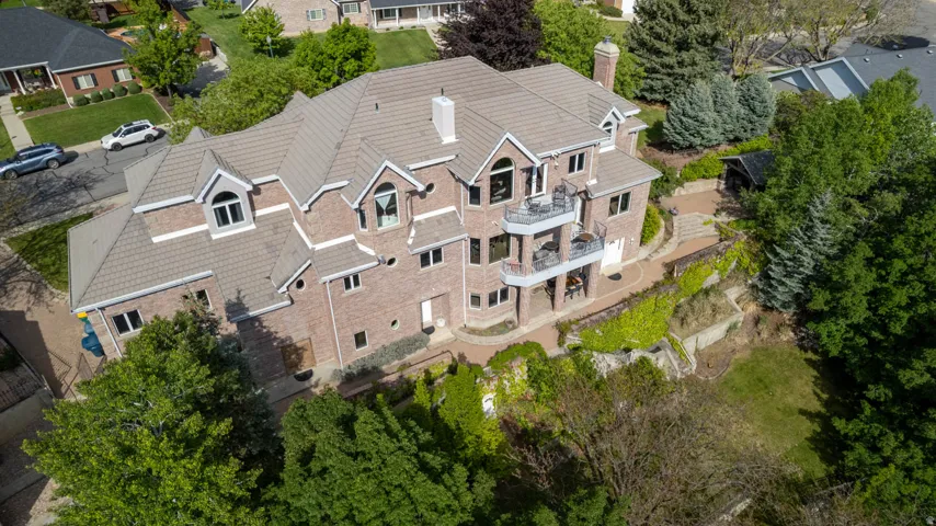 Brick exterior featuring a multi-level design with balconies