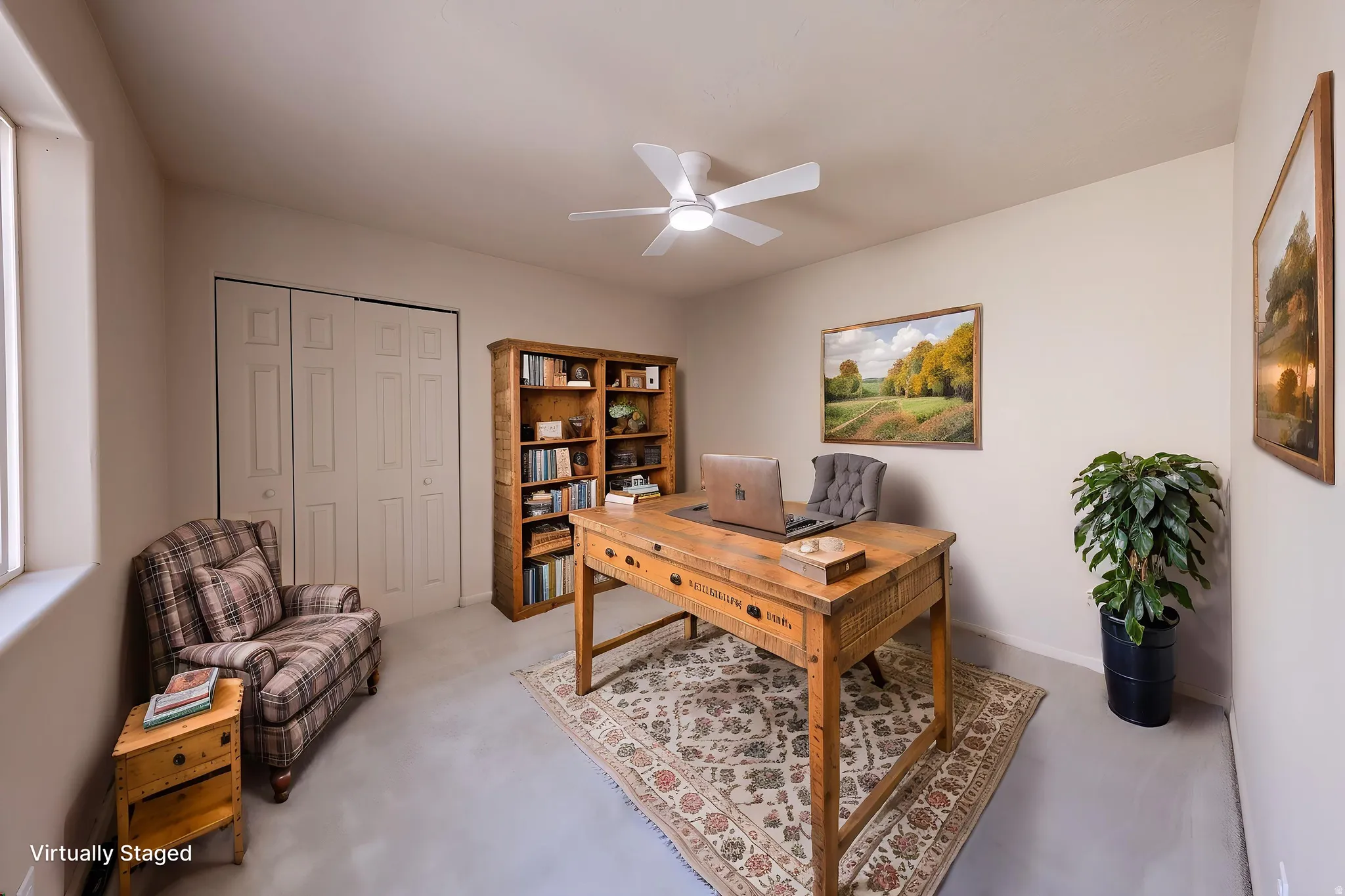 Versatile room featuring light-toned walls, a ceiling fan, and bi-fold closet doors