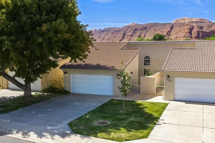 Southwestern-style stucco exterior with tile roofing
