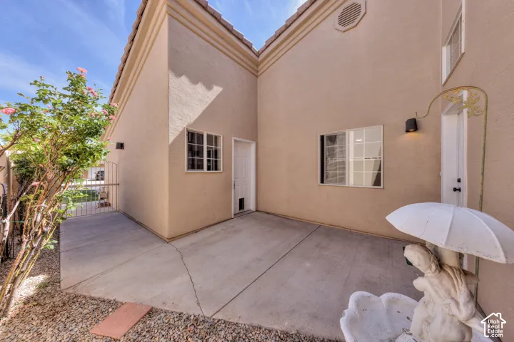 Exterior patio space with concrete flooring