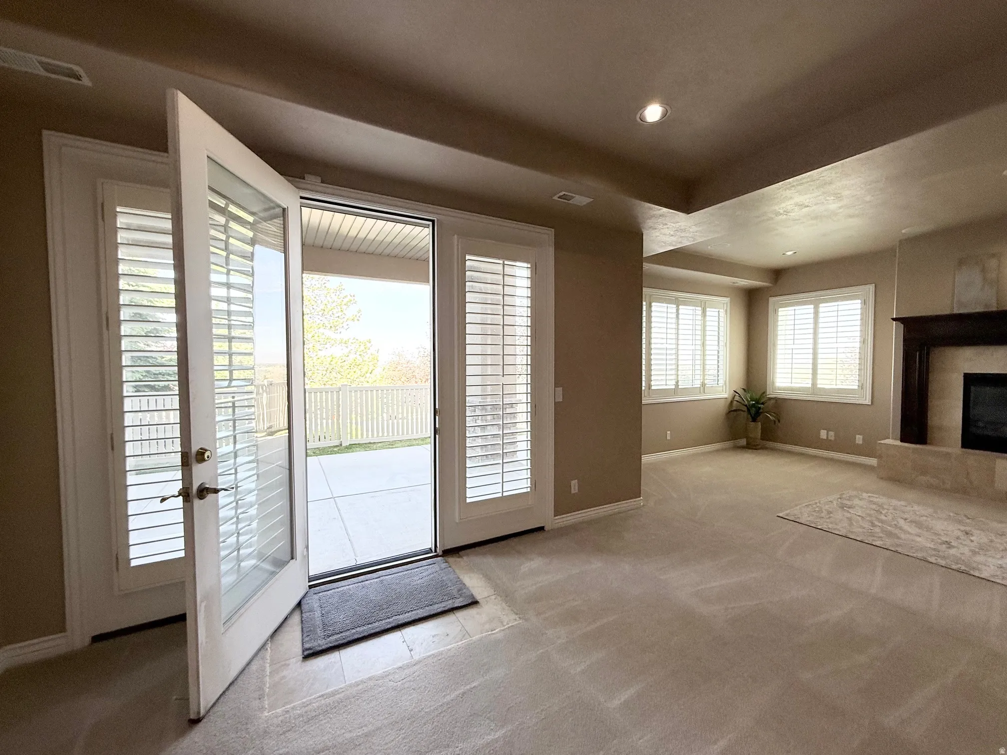 French doors opening to a covered patio