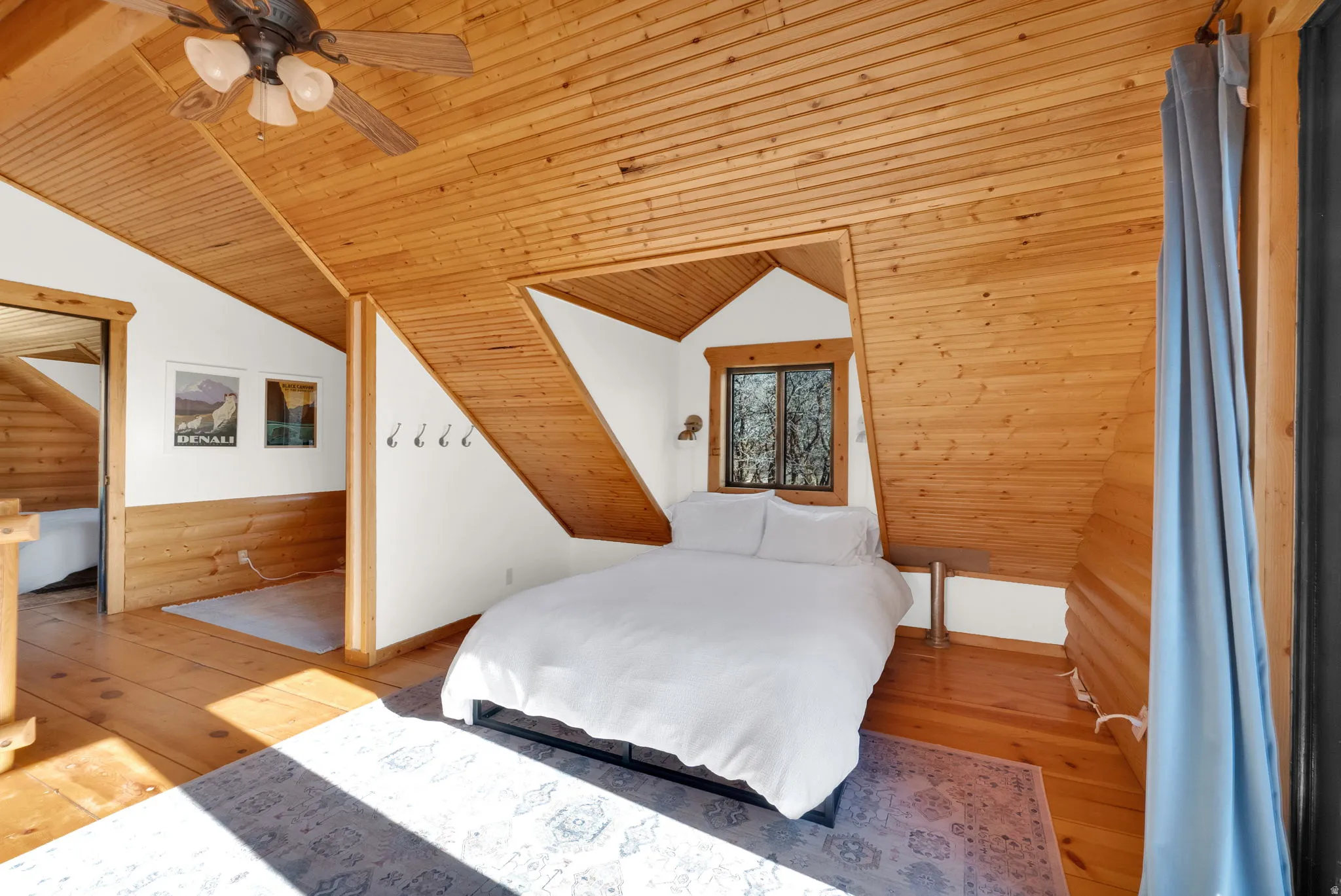 Vaulted wood-paneled ceilings with exposed beams