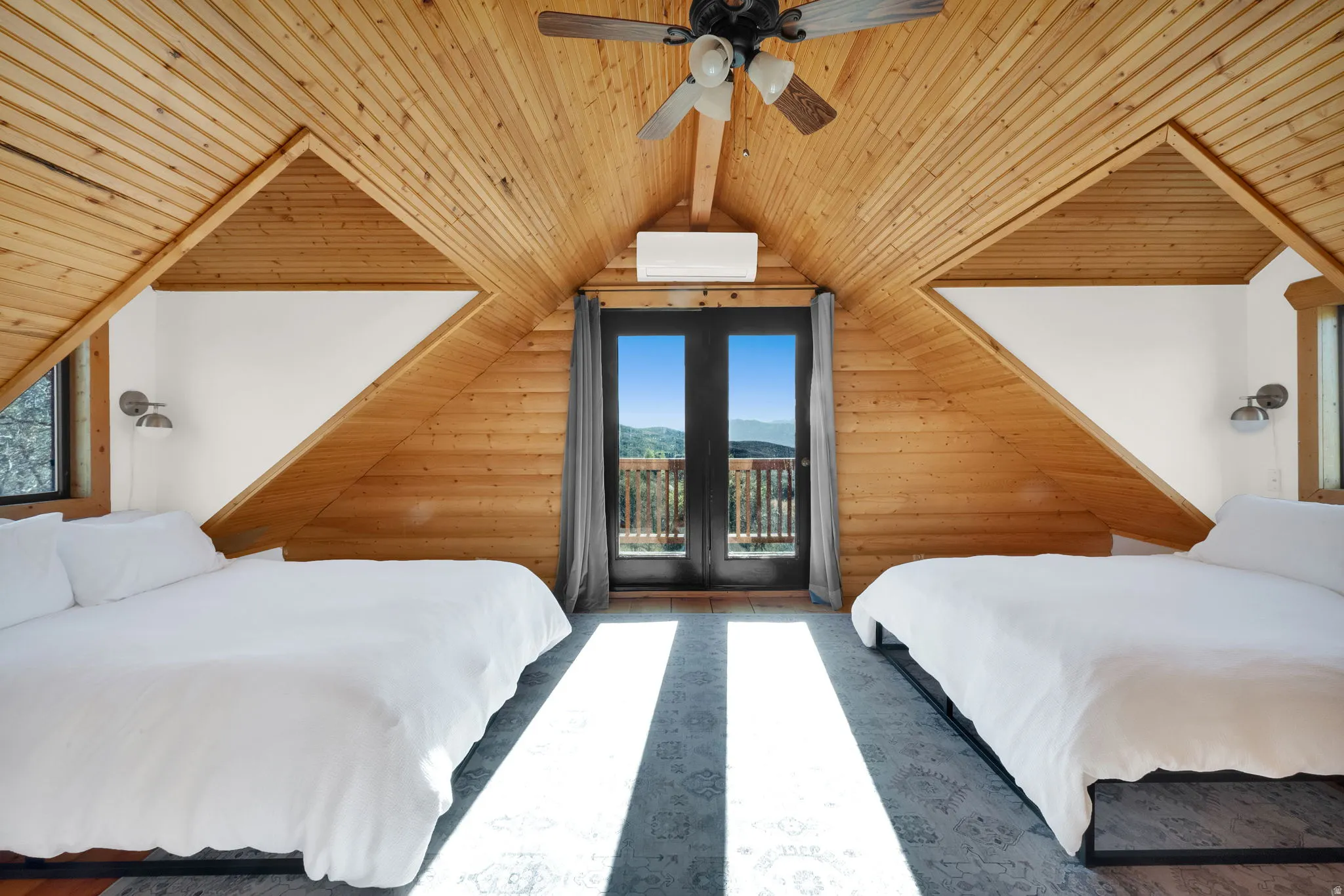 Vaulted wood-paneled ceiling with exposed beams