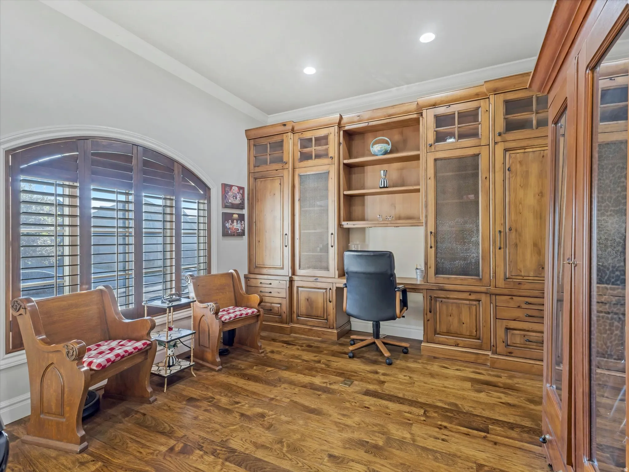Den with stylish wood built ins