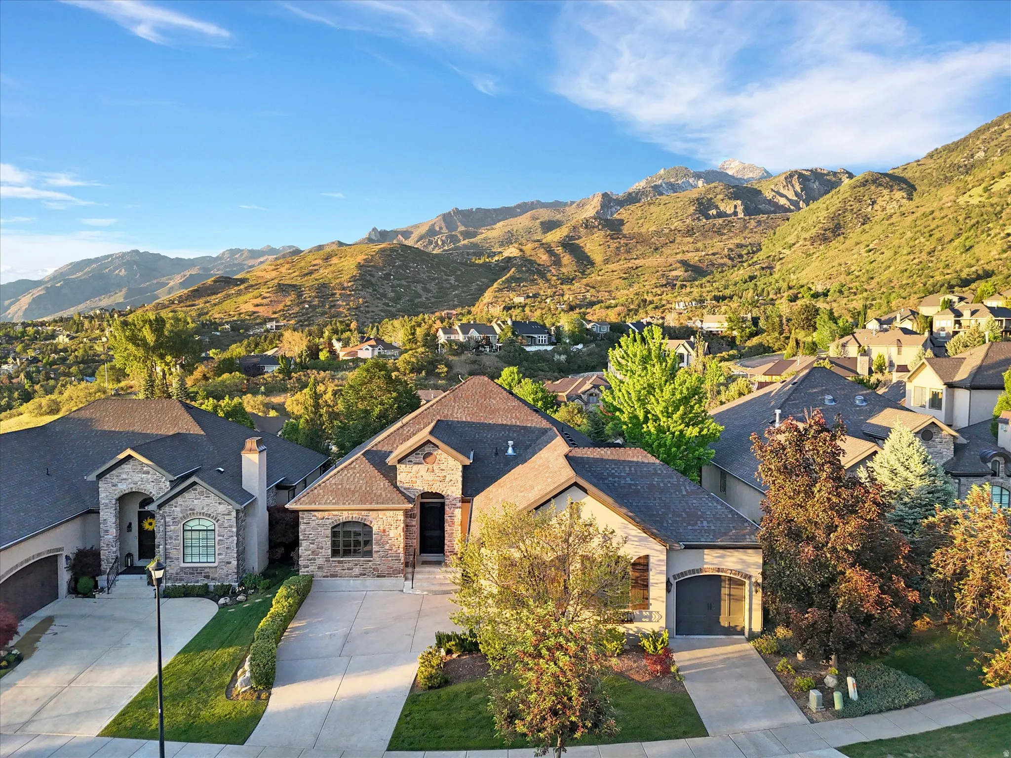 Aerial view of home in beautiful mountain setting