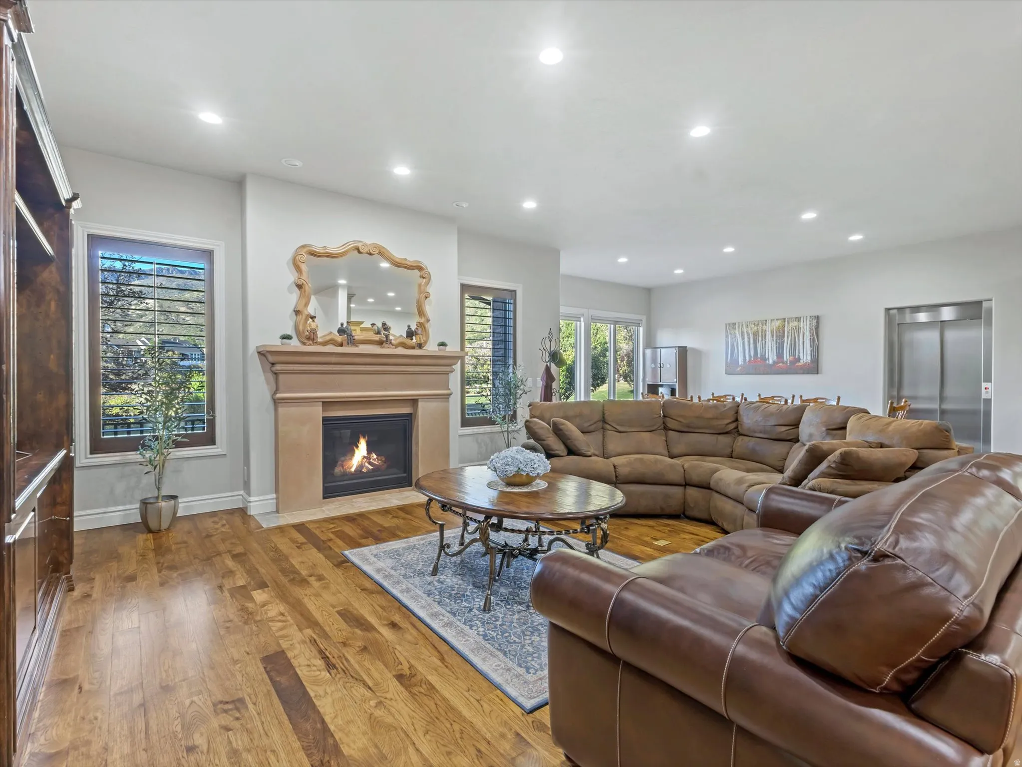 Living room with comfortable stone fireplace