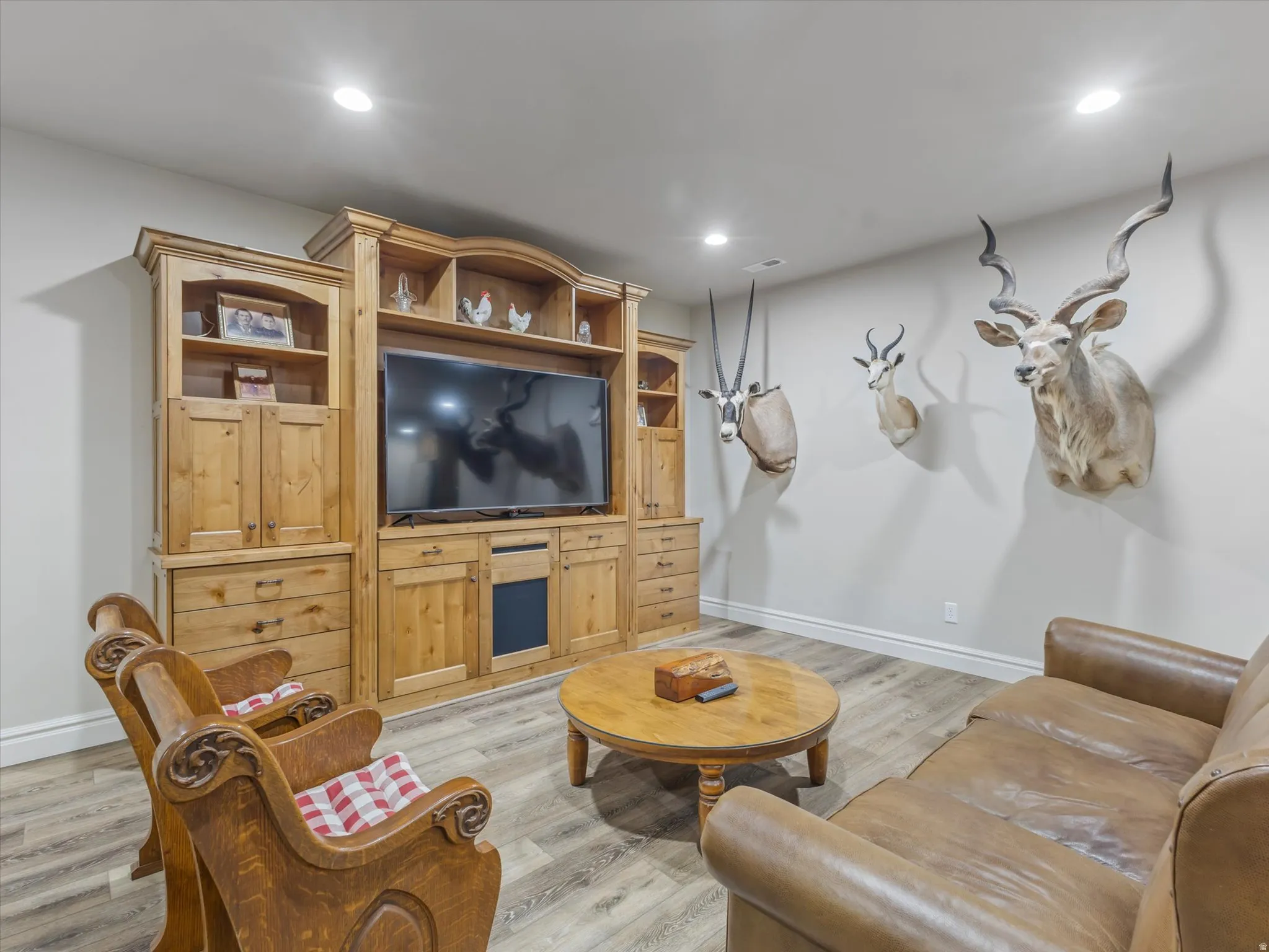 Built in entertainment center in basement great room