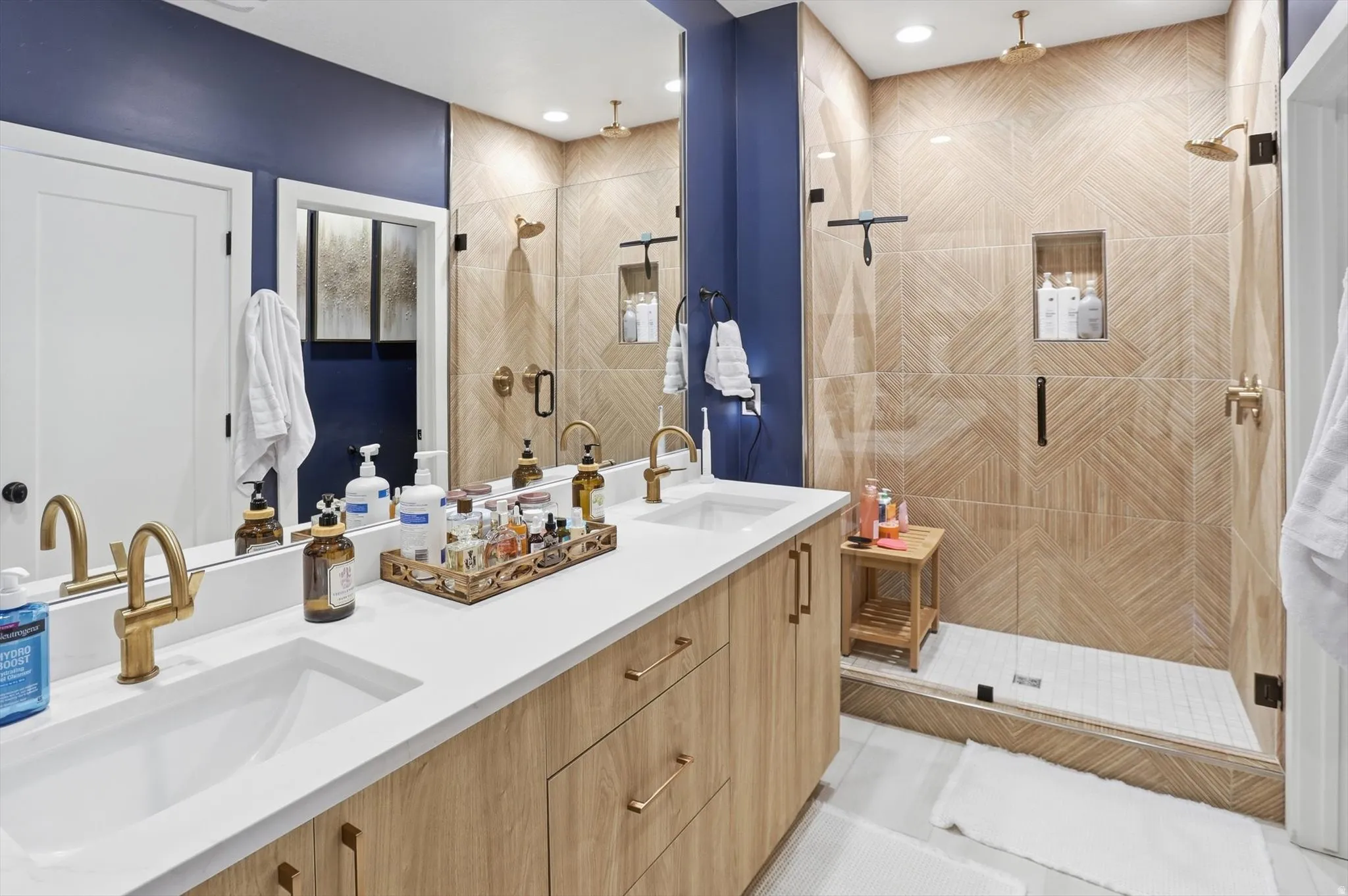 Dual vanity with integrated sinks and white countertops