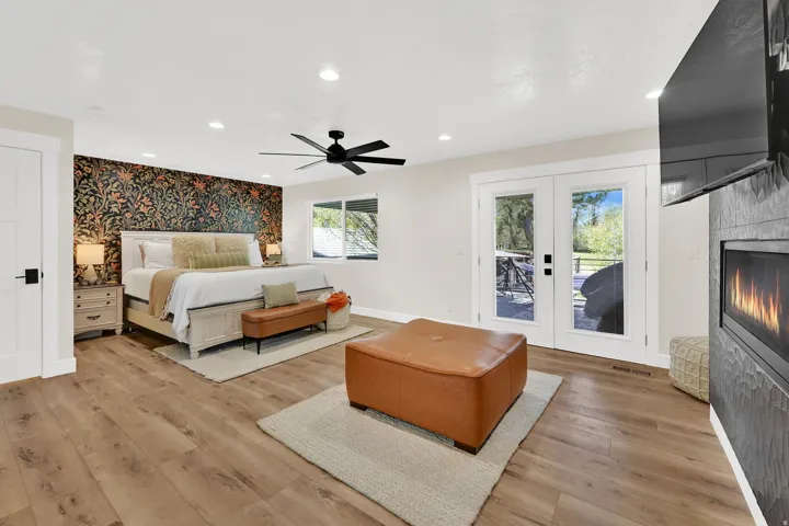 Primary Suite with exit to private covered deck.