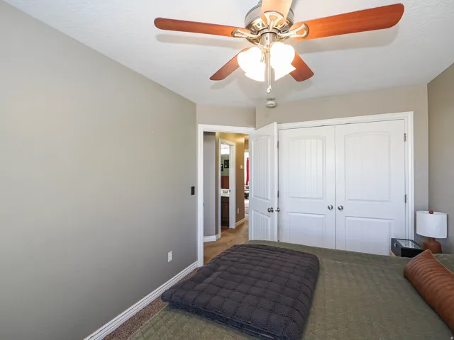 Neutral-toned walls and carpeted flooring define this interior space