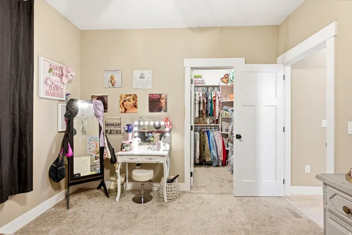Plush carpet flooring complements neutral wall tones